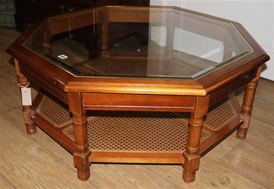 A modern glass topped octagonal coffee table W.97cm